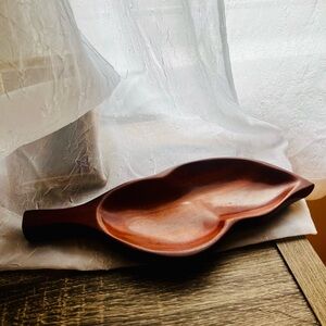 Solid wood leaf tray.